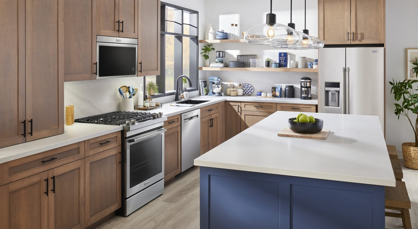 Modern kitchen featuring flush Maytag® appliances
