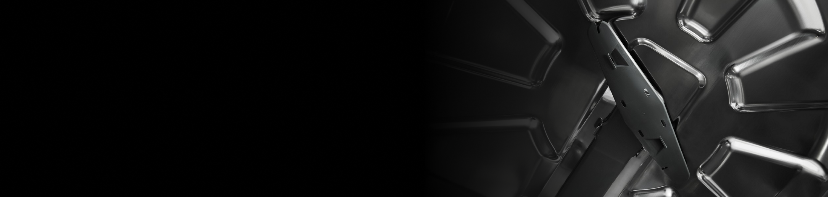 The top spray arm of a dishwasher