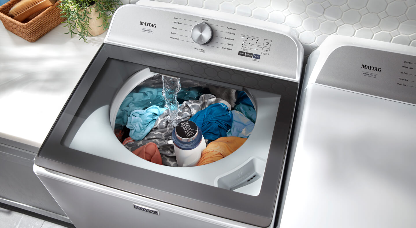 A Maytag® washing machine washing clothes