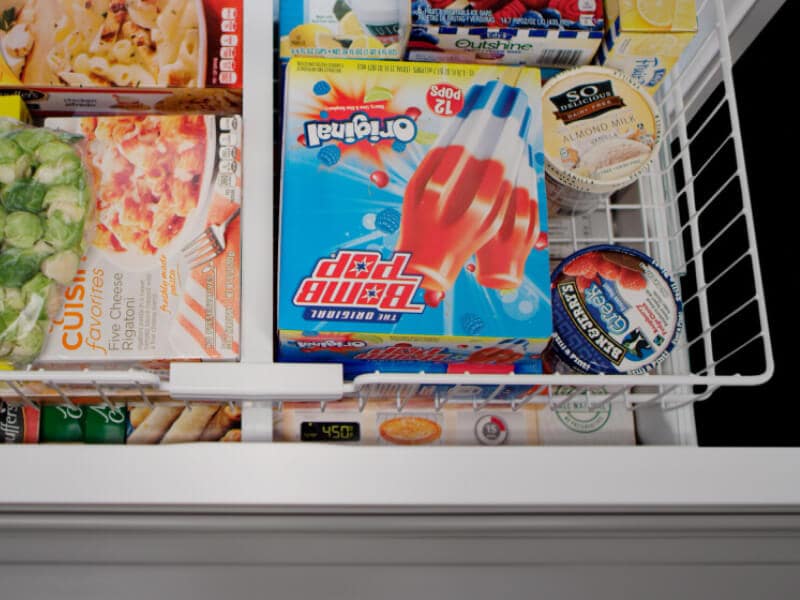 Close up of an open freezer drawer