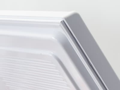Close-up of freezer door corner with door seal