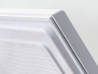 Close-up of freezer door corner with door seal