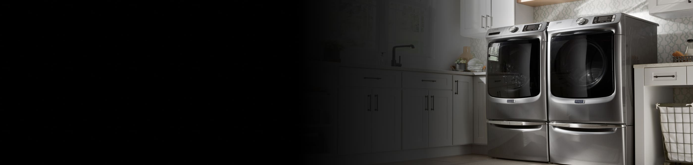 Maytag® dryer in a white laundry room