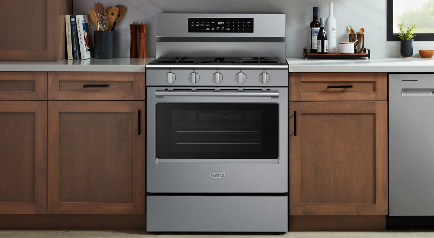 Maytag® gas range inside a modern kitchen