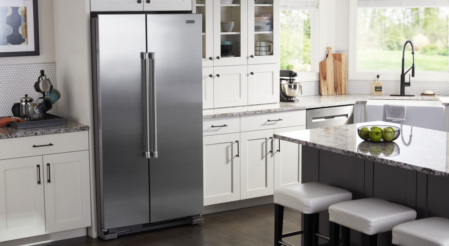 Side-by-side refrigerator in a kitchen
