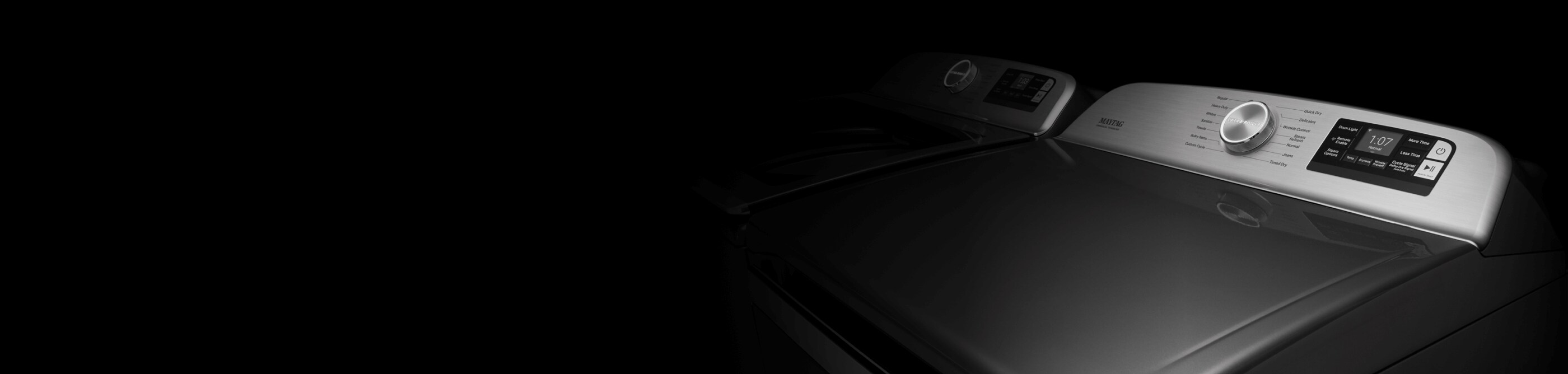 The consoles of a Maytag® top load washer and dryer