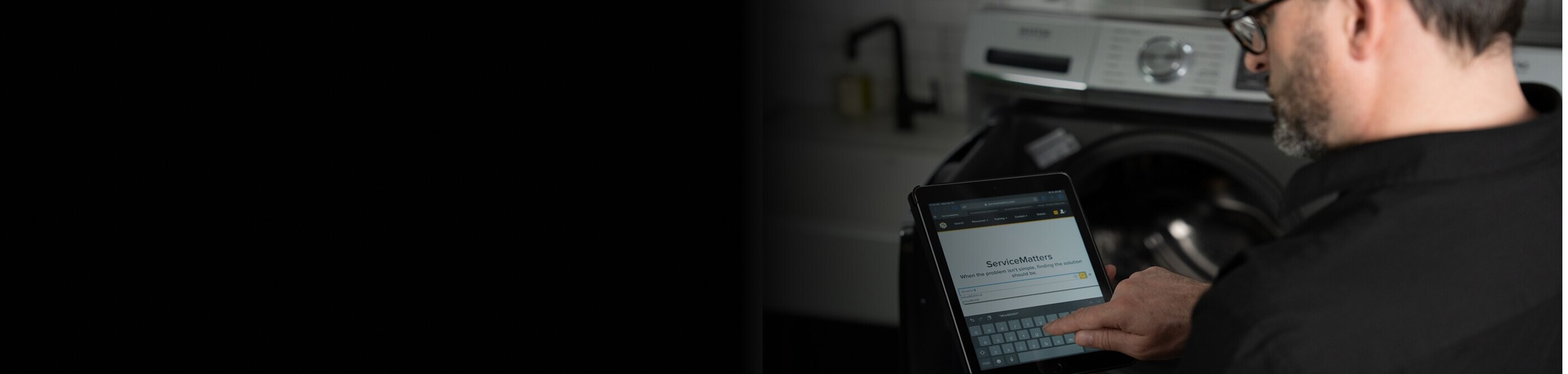 Person filling out a service form on a tablet