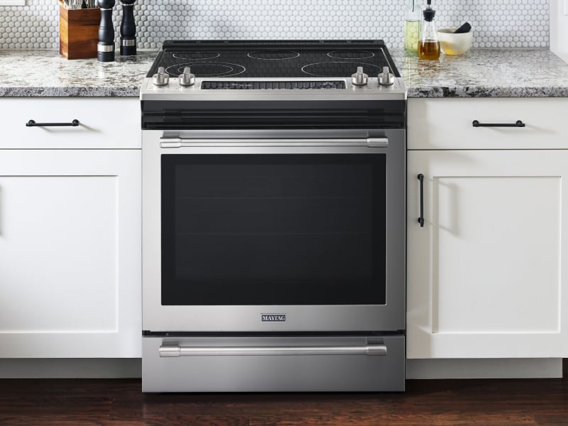 Interior shot of kitchen featuring Maytag® electric range. Interior shot of kitchen featuring Maytag® electric range.