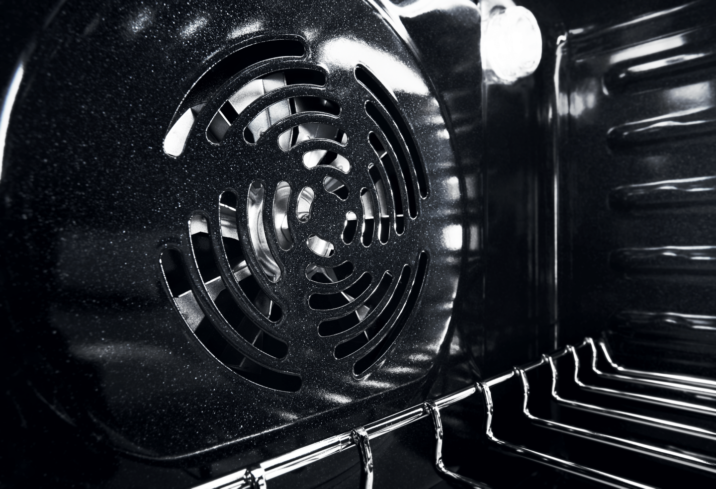 Closeup of the vent in back of the oven interior Closeup of the vent in back of the oven interior