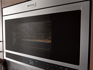 A stainless steel Maytag® microwave