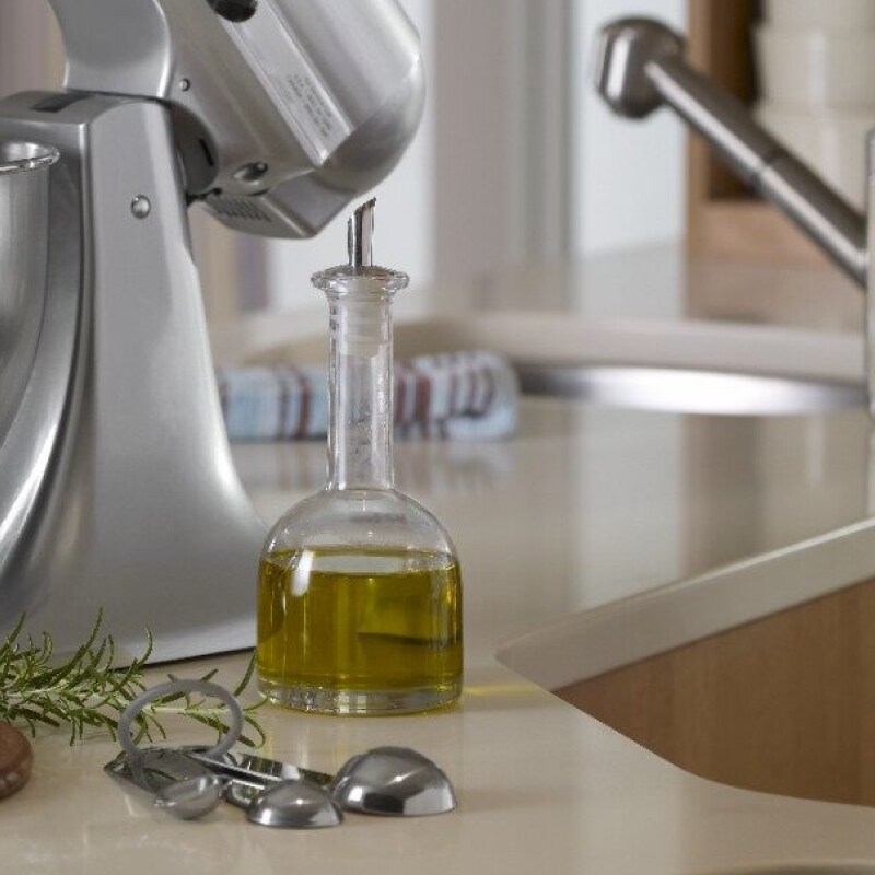 Bottle of olive oil resting on a countertop