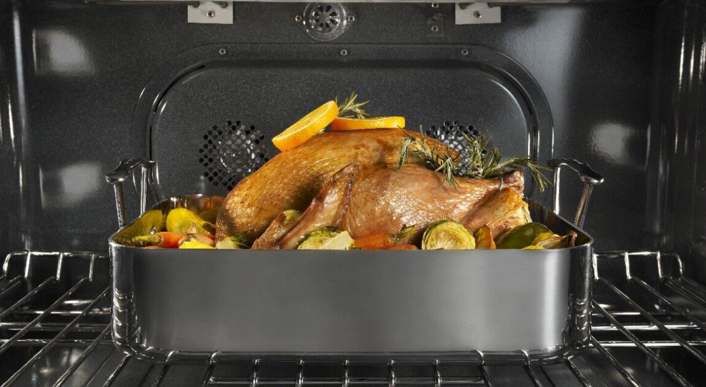 Turkey in the oven garnished with citrus and herbs Turkey in the oven garnished with citrus and herbs