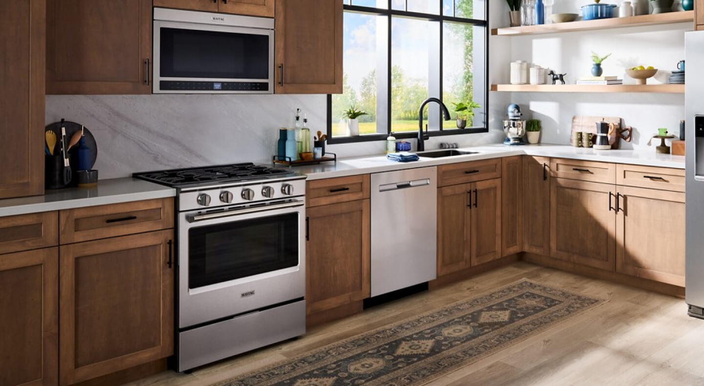 Maytag® over-the-range microwave and gas range
