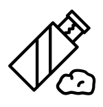 A stick of gum with a wad of chewed gum next to it