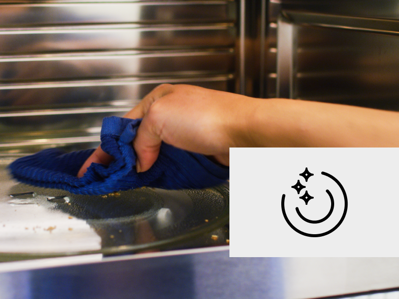 Cleaning a microwave turntable. Cleaning a microwave turntable.