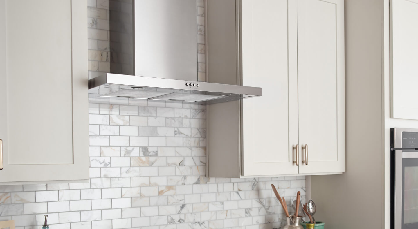Range hood in a bright kitchen