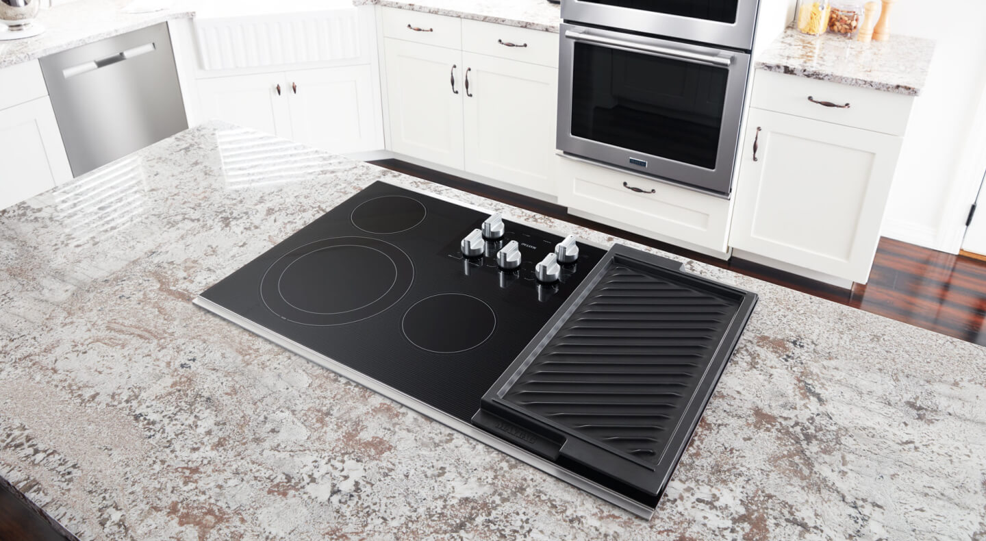 Maytag® electric cooktop installed in a kitchen island