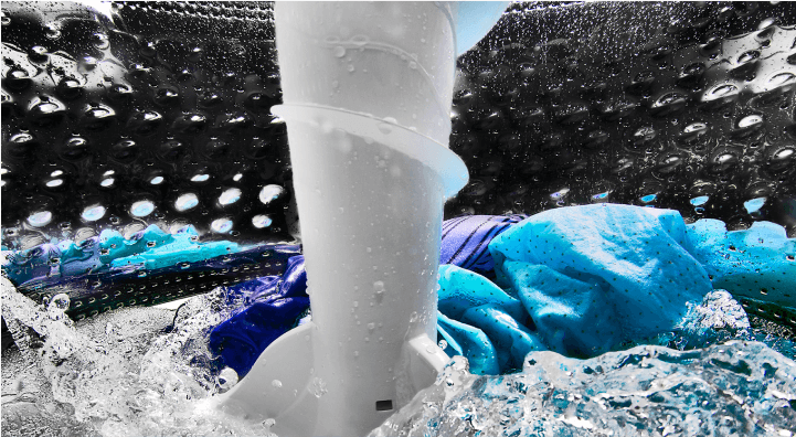 Agitator twisting inside a washing machine tub Agitator twisting inside a washing machine tub