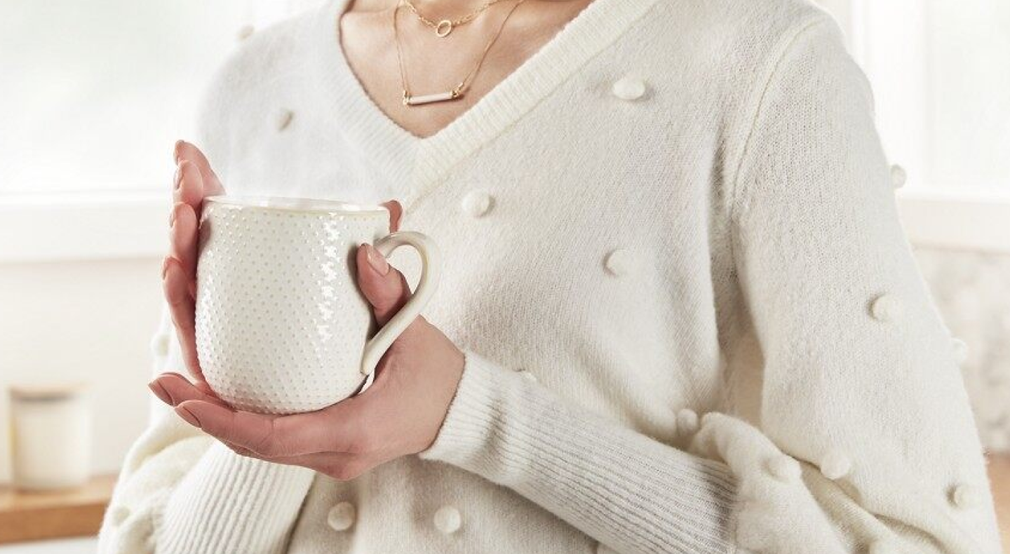 A person wearing a cashmere sweater A person wearing a cashmere sweater