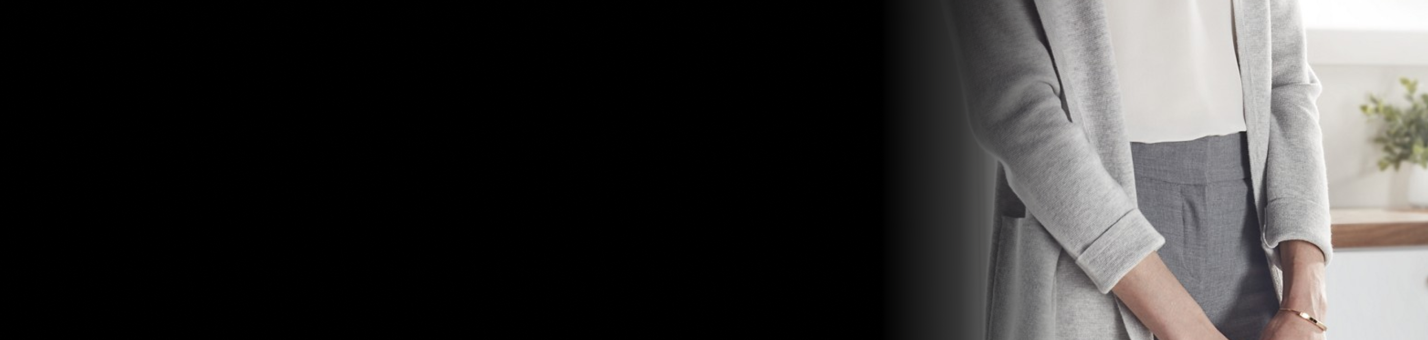 A person standing in a laundry area