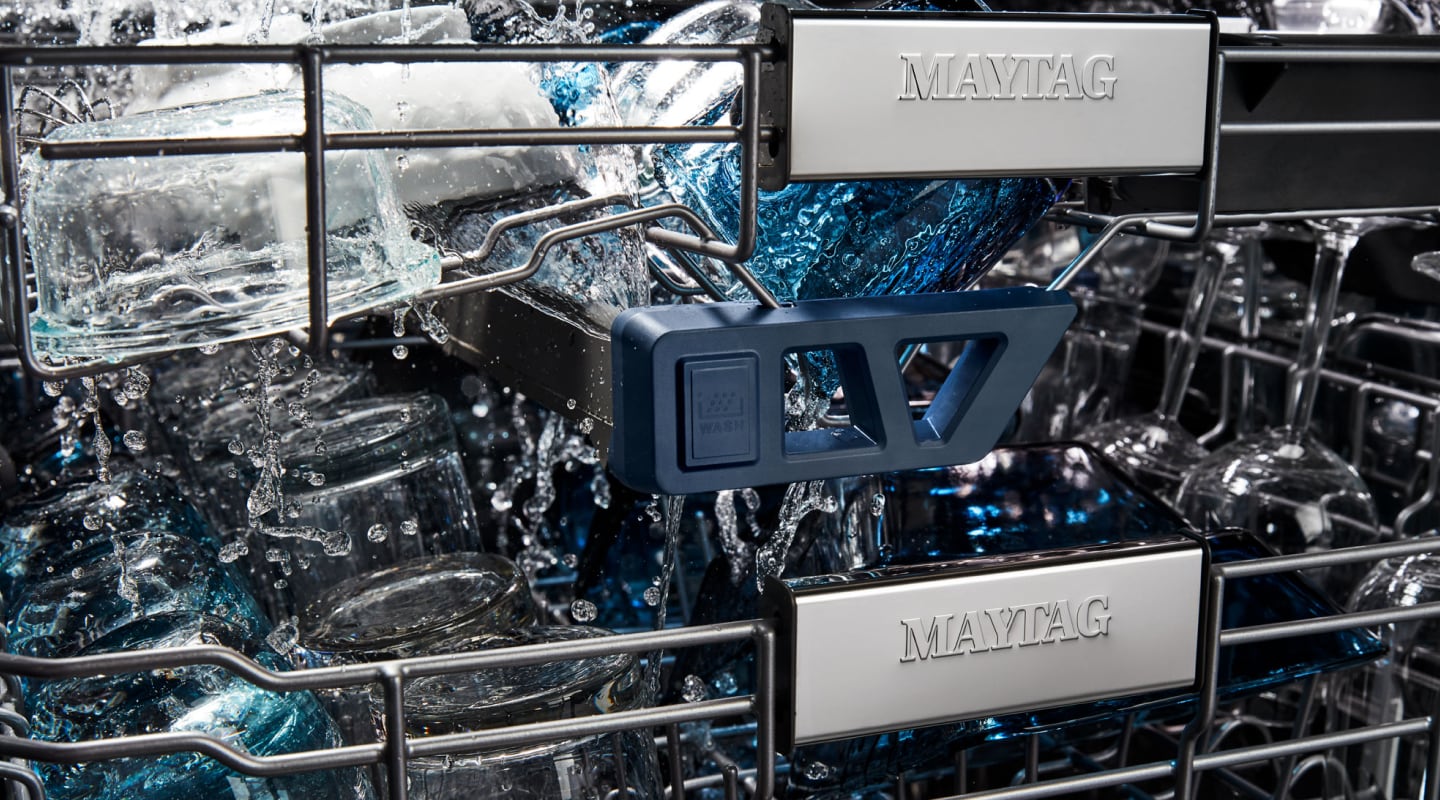 Close-up of glassware during wash cycle Close-up of glassware during wash cycle