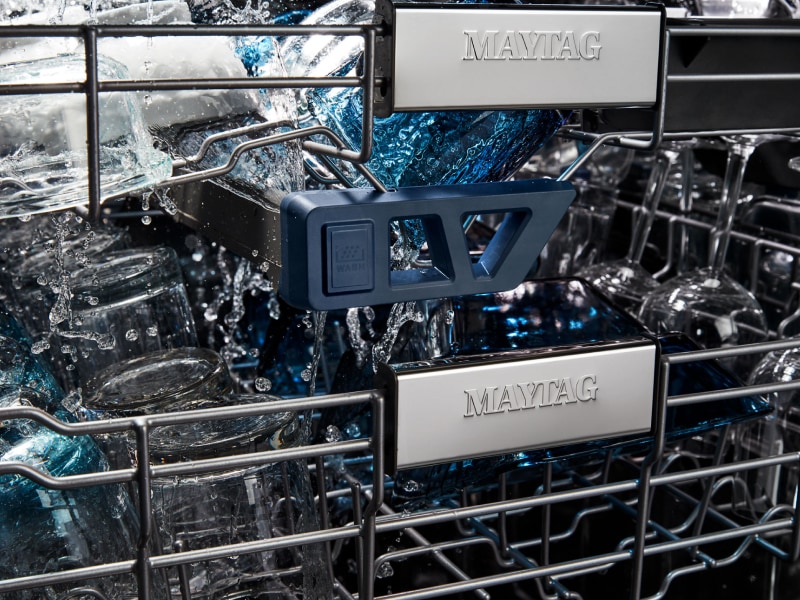 Close-up of glassware during wash cycle Close-up of glassware during wash cycle