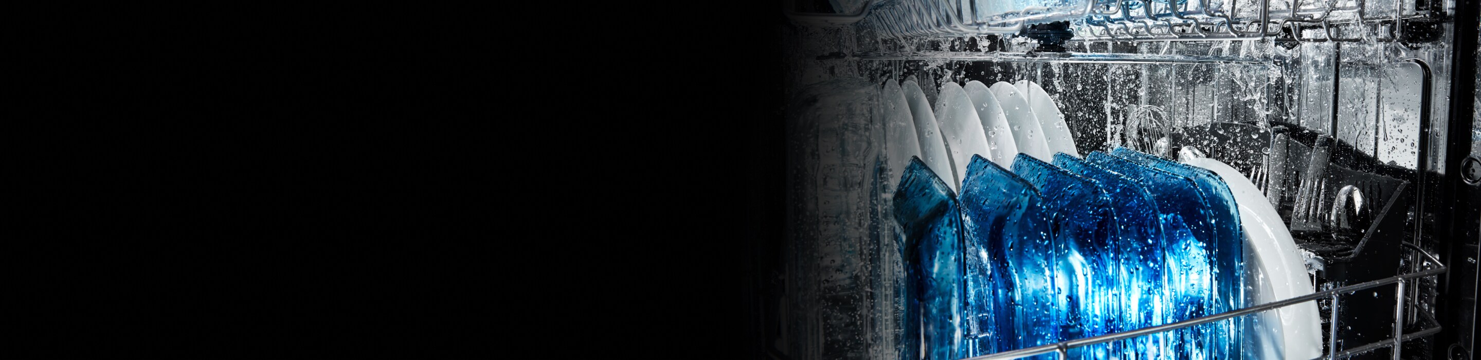 Close-up of dishes washing during cycle