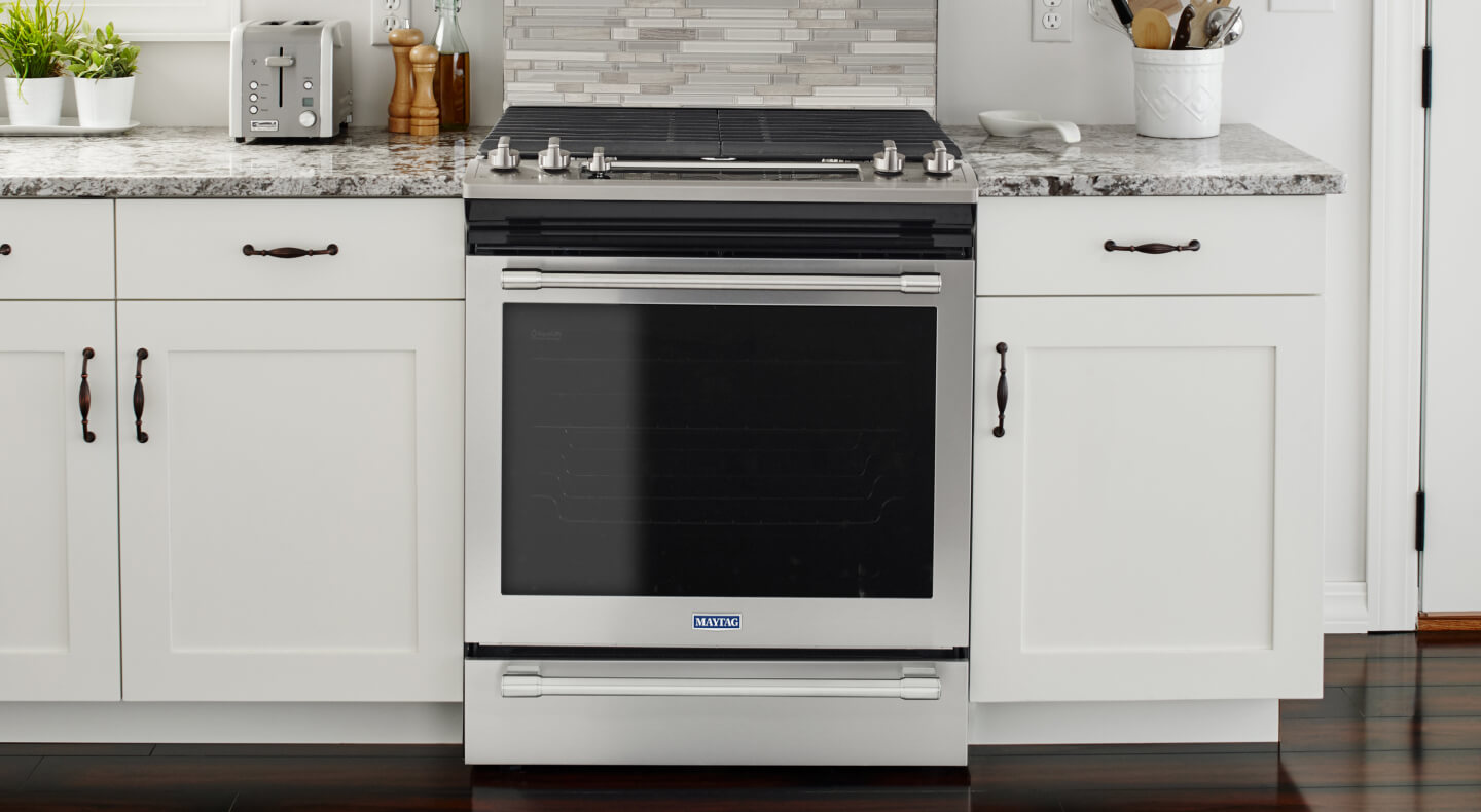 Clean gas range stovetop