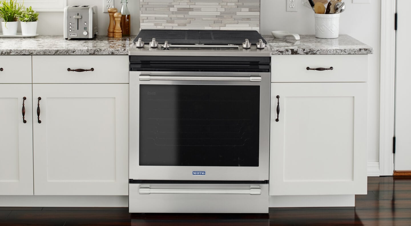 Clean gas range stovetop