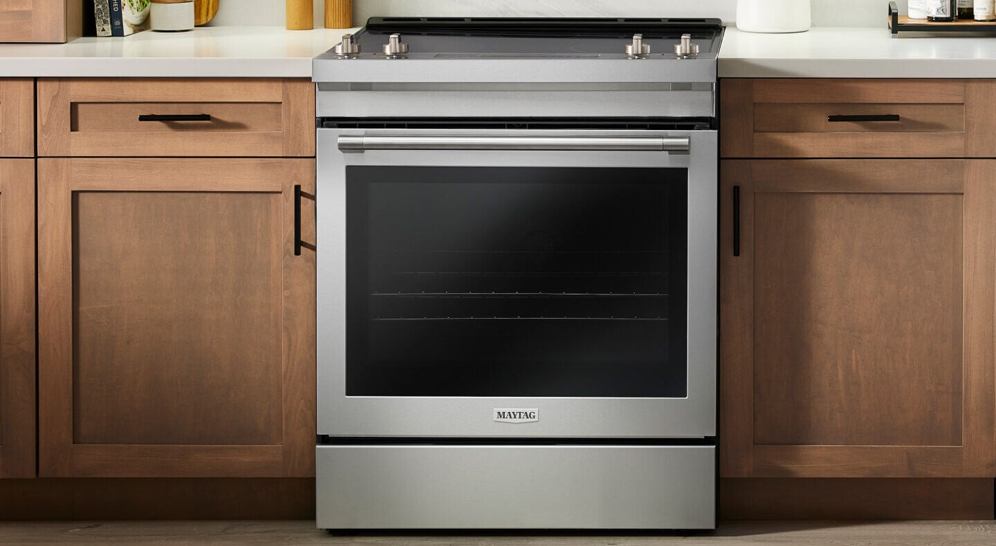 Maytag® slide-in range in a bright kitchen