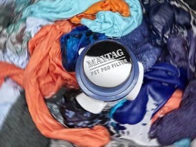 Overhead shot of clothes in washer mid cycle