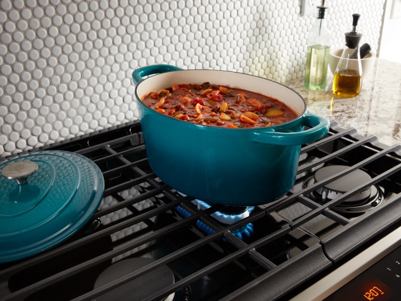 Vegetable stew cooking on a gas stove Vegetable stew cooking on a gas stove