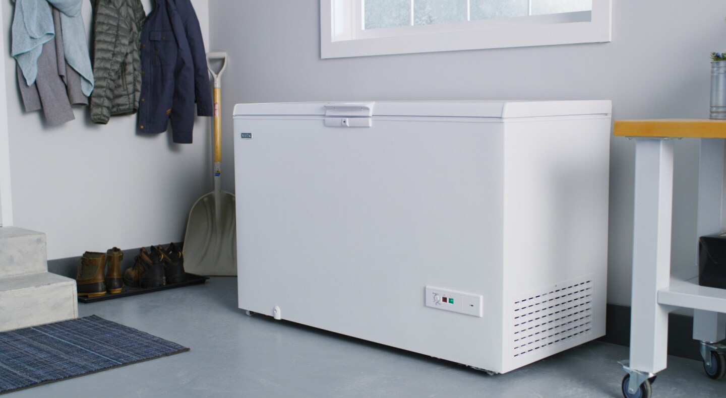 White Maytag® chest freezer in garage White Maytag® chest freezer in garage