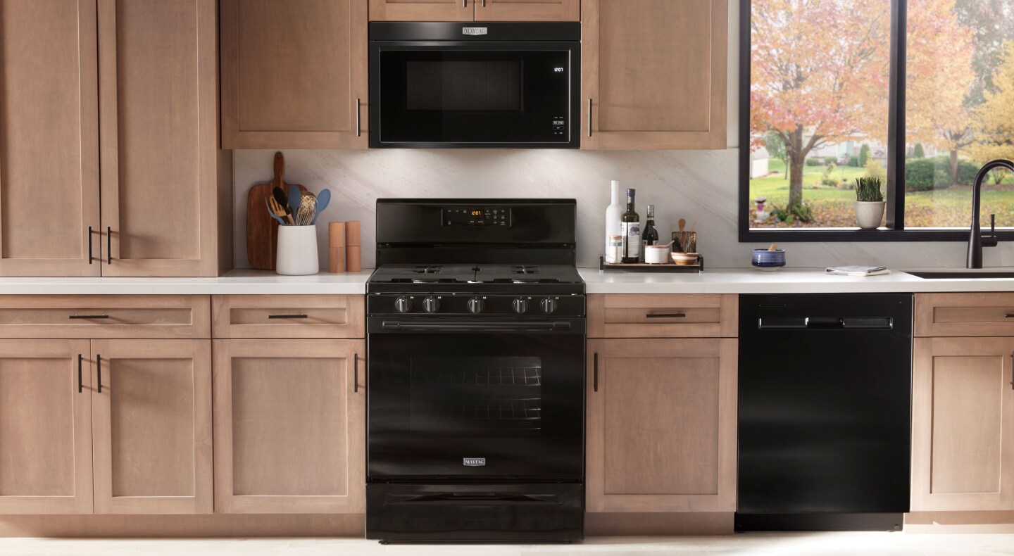 Black Maytag® built-in microwave and gas range
