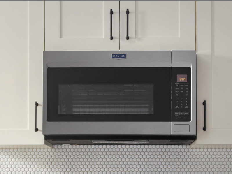 A closeup of a Maytag® over-the-range microwave. A closeup of a Maytag® over-the-range microwave.
