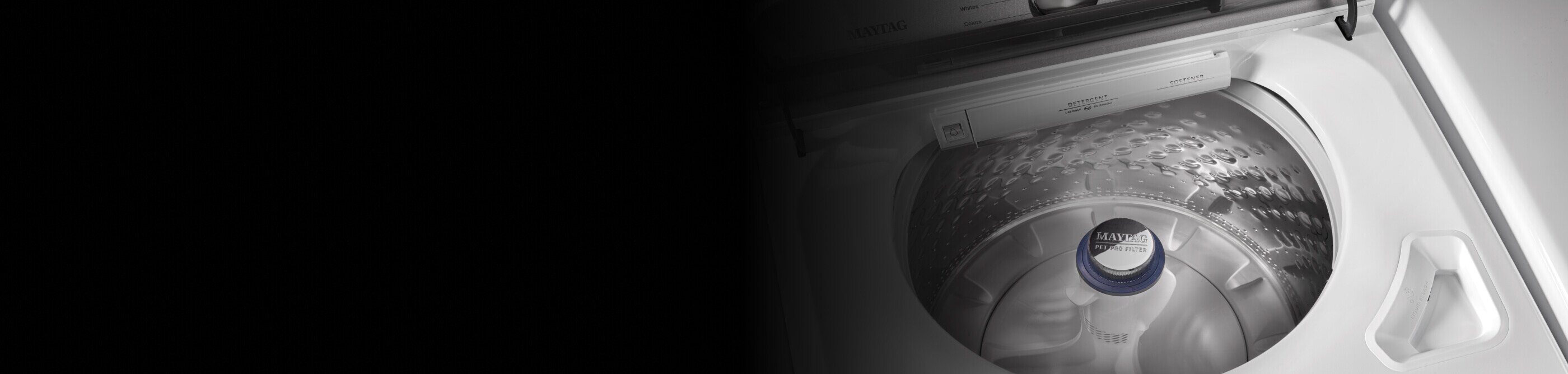 A close-up of the interior of a Maytag® top load washer