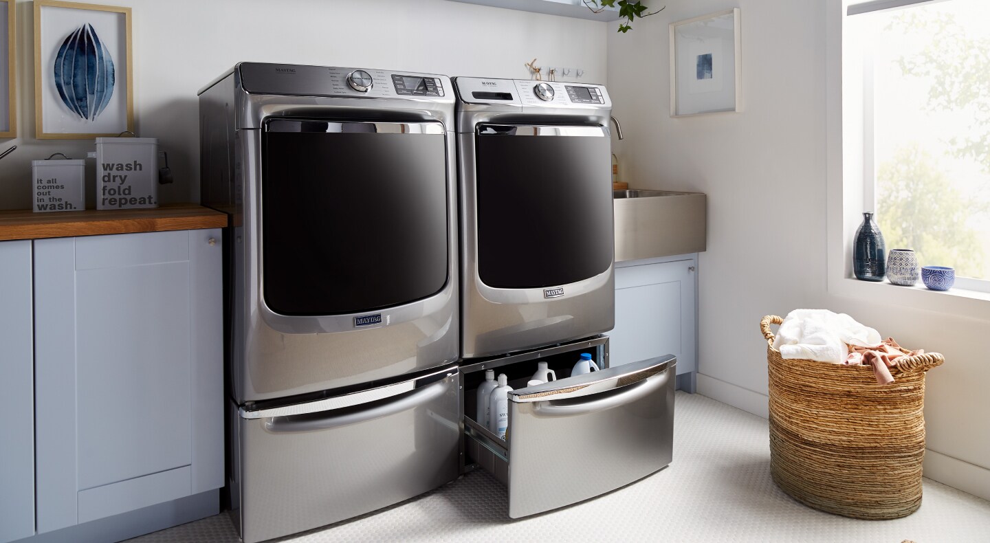 A stainless steel Maytag® washer and dryer set A stainless steel Maytag® washer and dryer set