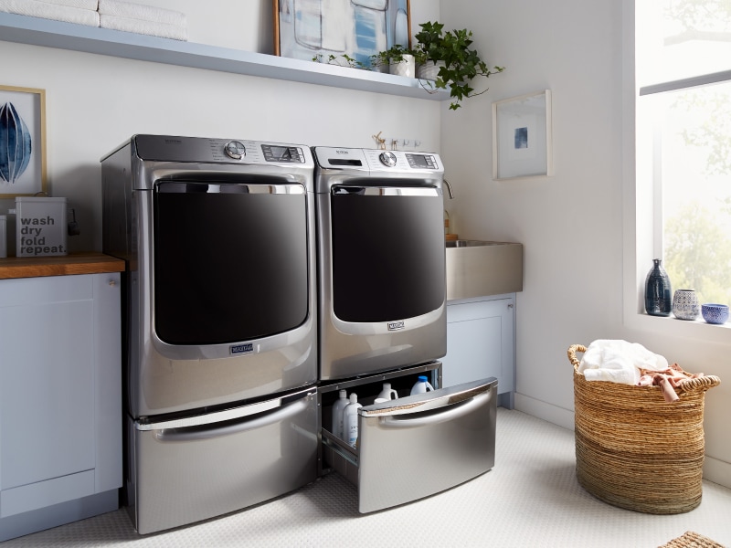 A stainless steel Maytag® washer and dryer set A stainless steel Maytag® washer and dryer set