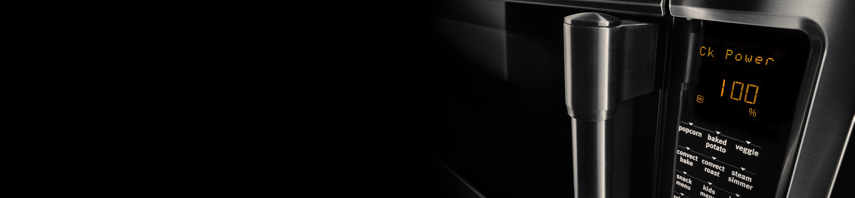 A close up image of a microwave door handle