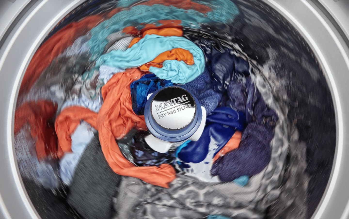 Clothes spinning in a Maytag® washer with a Pet Pro Filter Clothes spinning in a Maytag® washer with a Pet Pro Filter