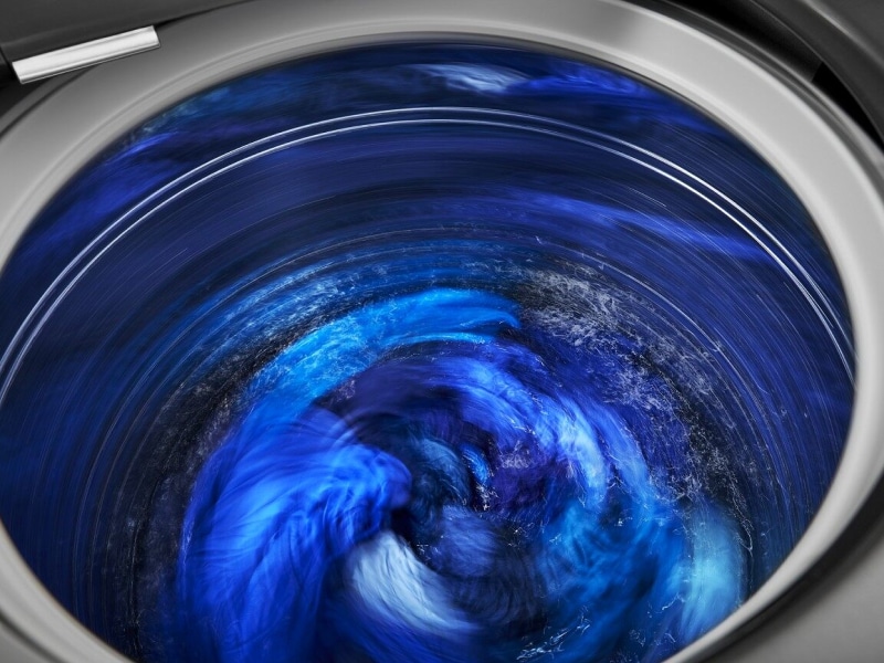 Inside of active washing machine Inside of active washing machine