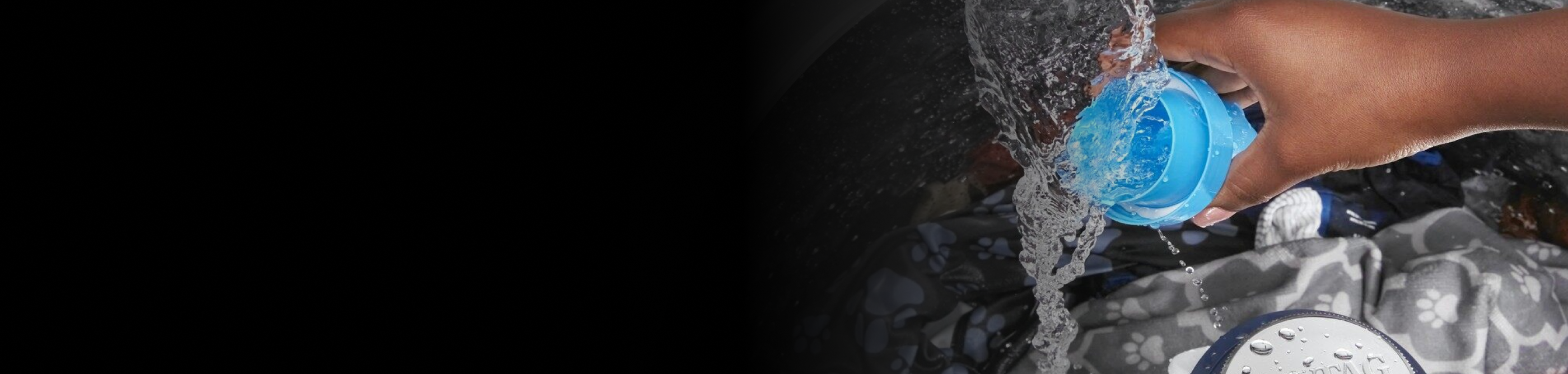 Hand rinsing detergent cup under running water