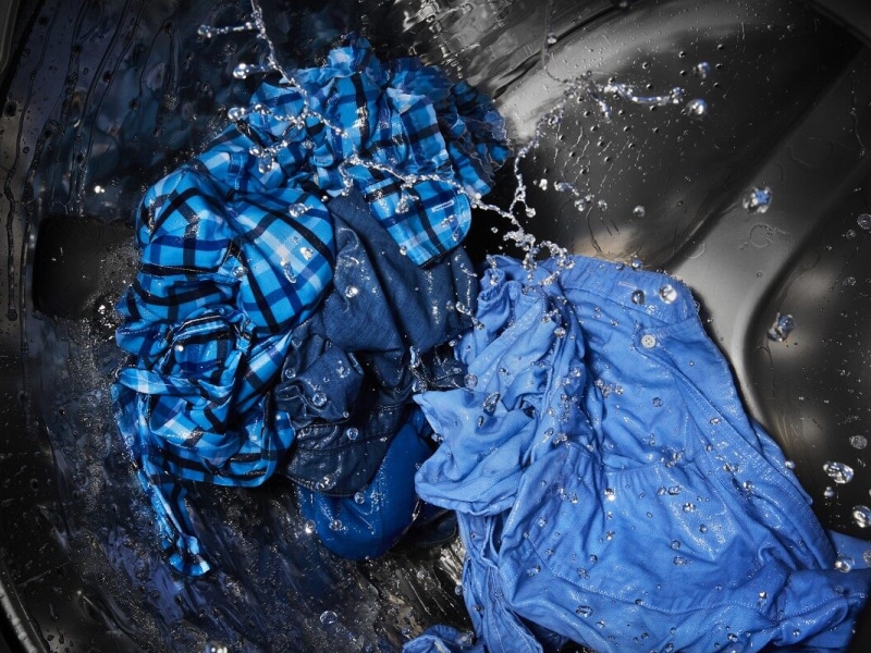 Action shot of a load of laundry in the washing machine Action shot of a load of laundry in the washing machine