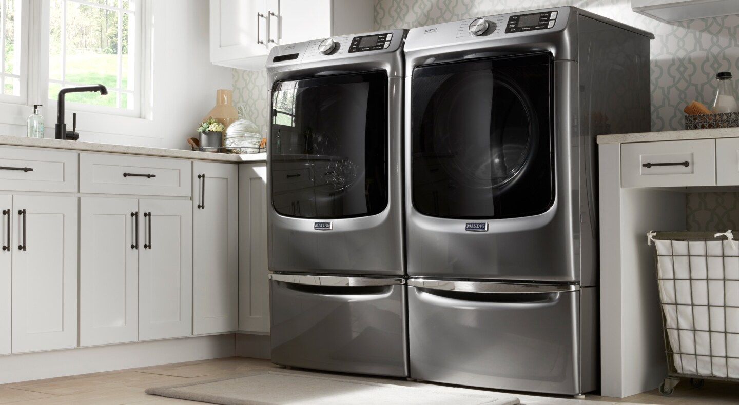 Maytag® washer and dryer set in a modern style laundry room