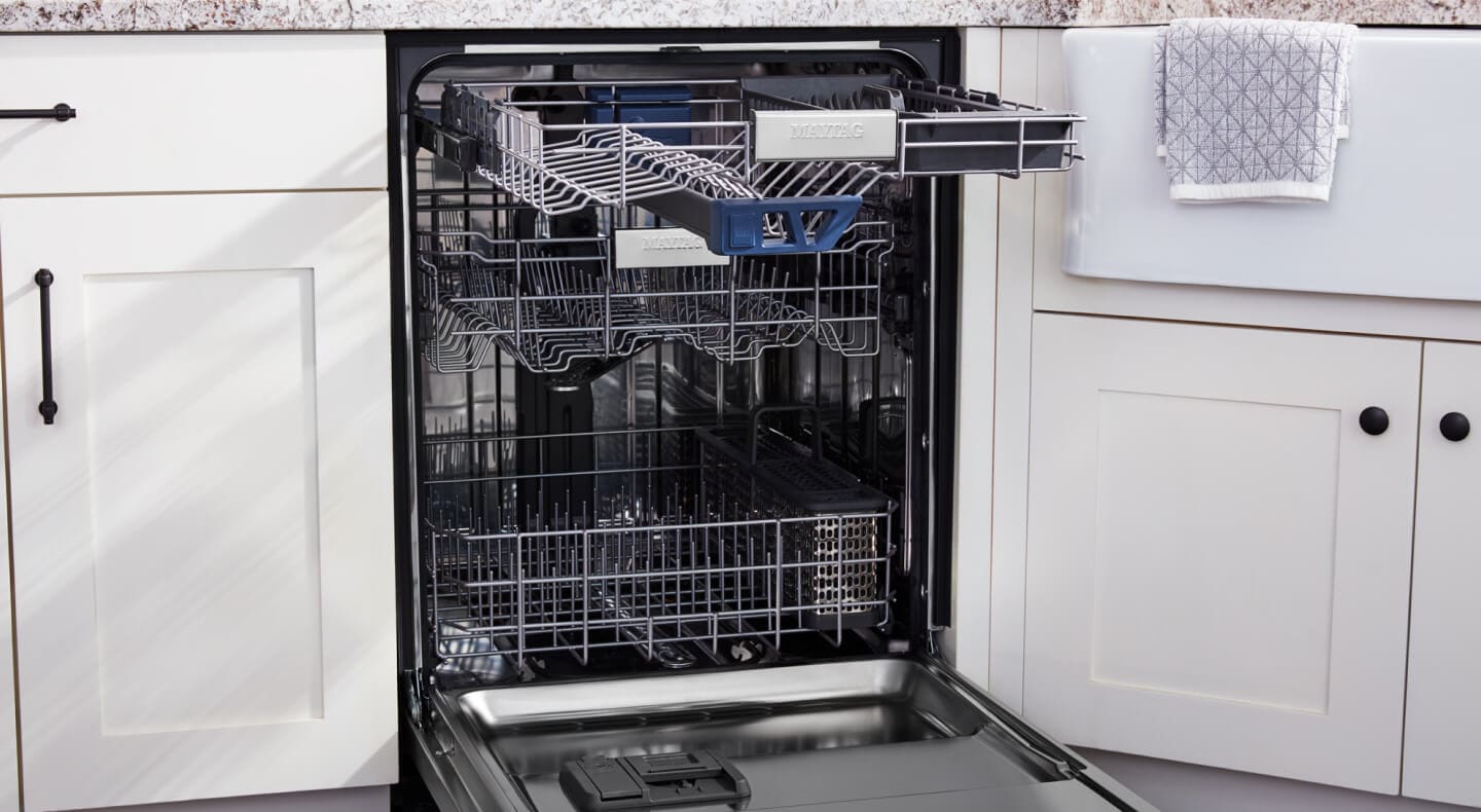 An opened dishwasher with a 3rd Rack