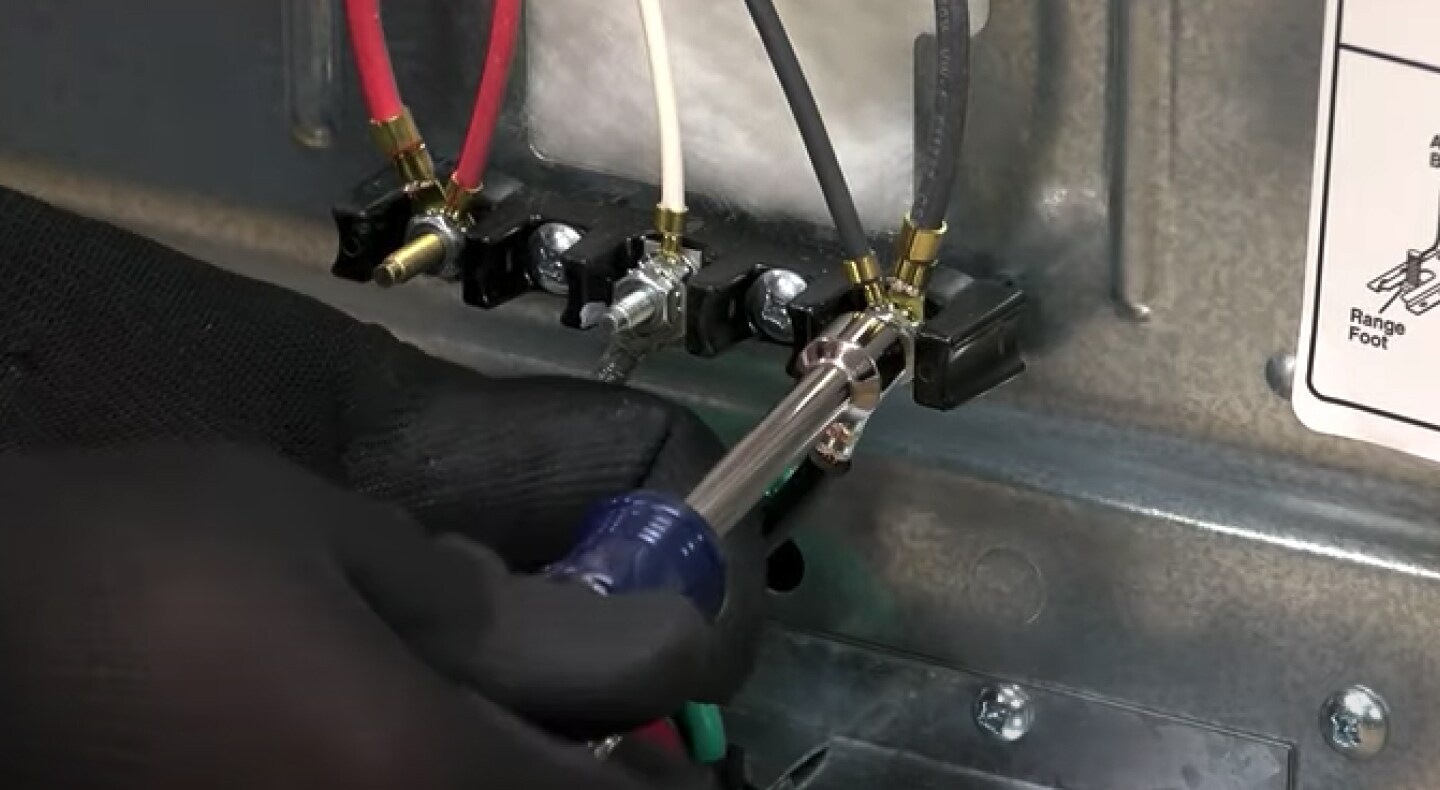 A closeup of stove power cords A closeup of stove power cords