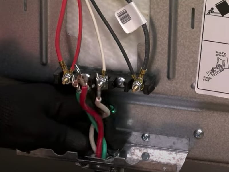 A closeup of stove power cords A closeup of stove power cords