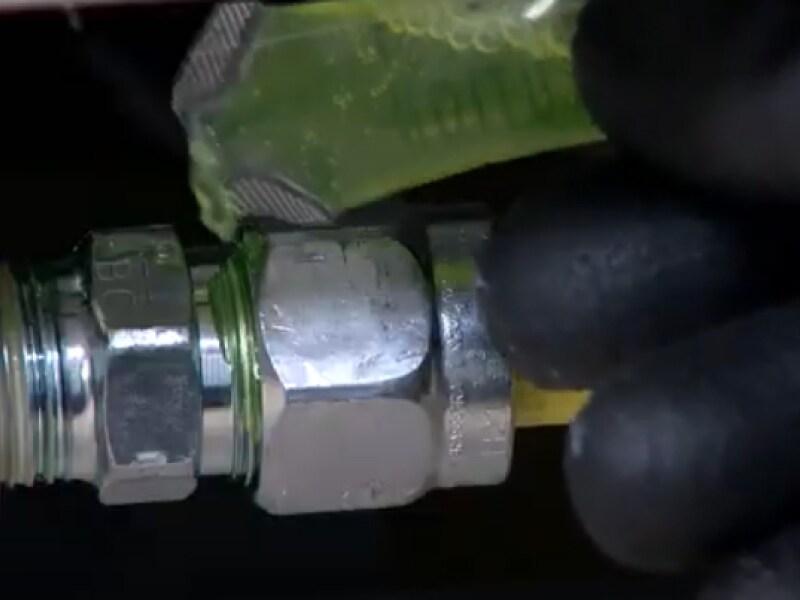 A closeup of checking for gas leaks A closeup of checking for gas leaks