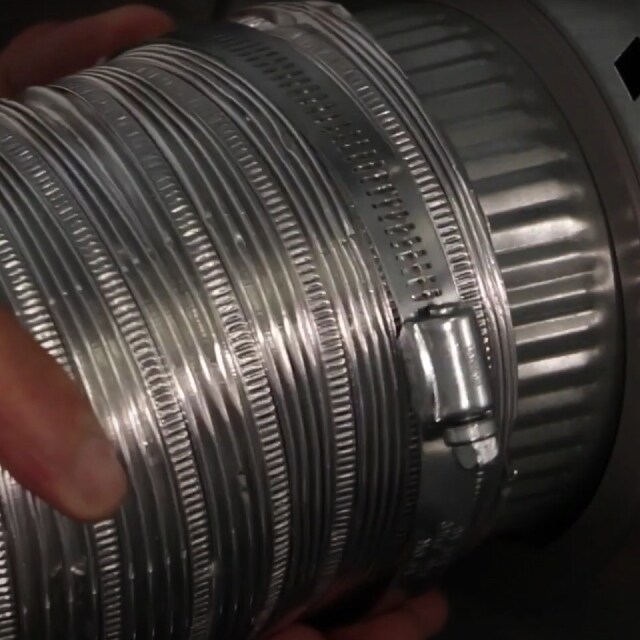 The vent exhaust is secured to a dryer