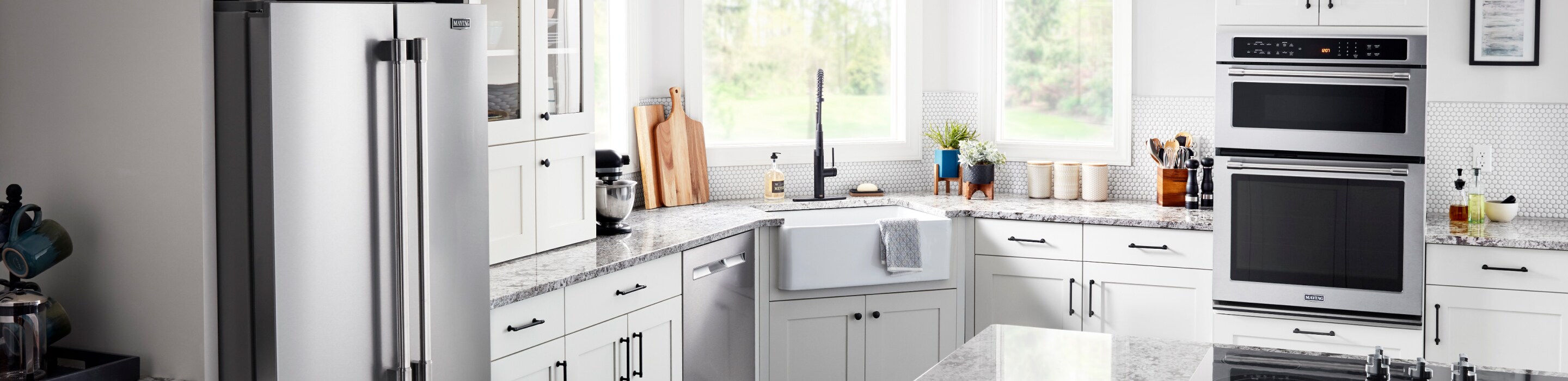 Maytag® Combination wall oven in a white kitchen 